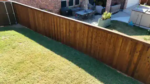 Aerial view of cedar fencing around a residential property.