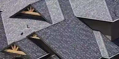 Roof shingles and dormers fill this close construction view.